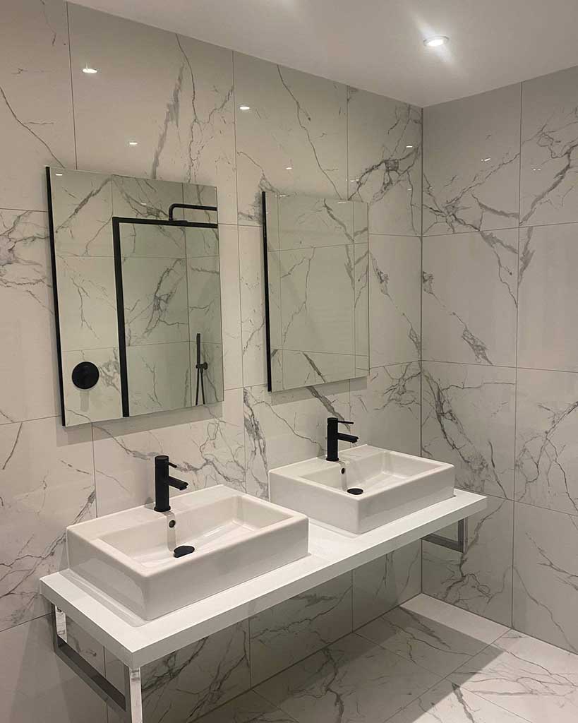 Twin basins on a marble-effect vanity