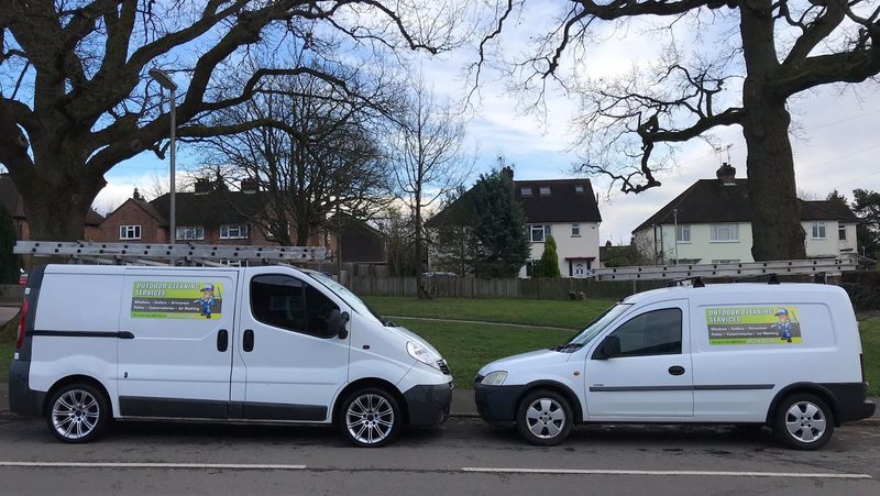 Outdoor Cleaning Services' two vans